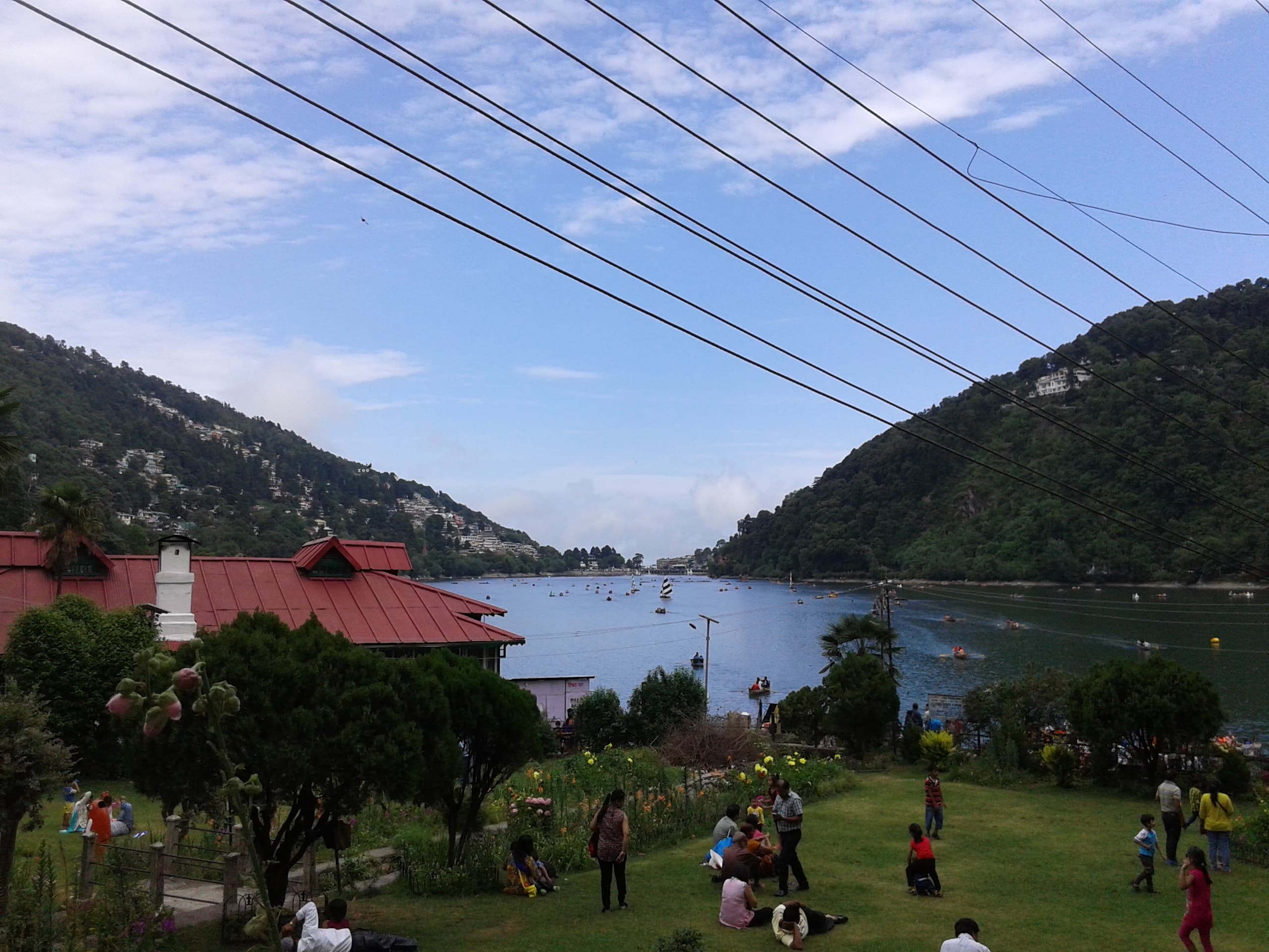 My first photograph of Naini Lake, taken through the hillside railings in 2015