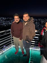 Night portrait with Sangam against Aizawl city lights