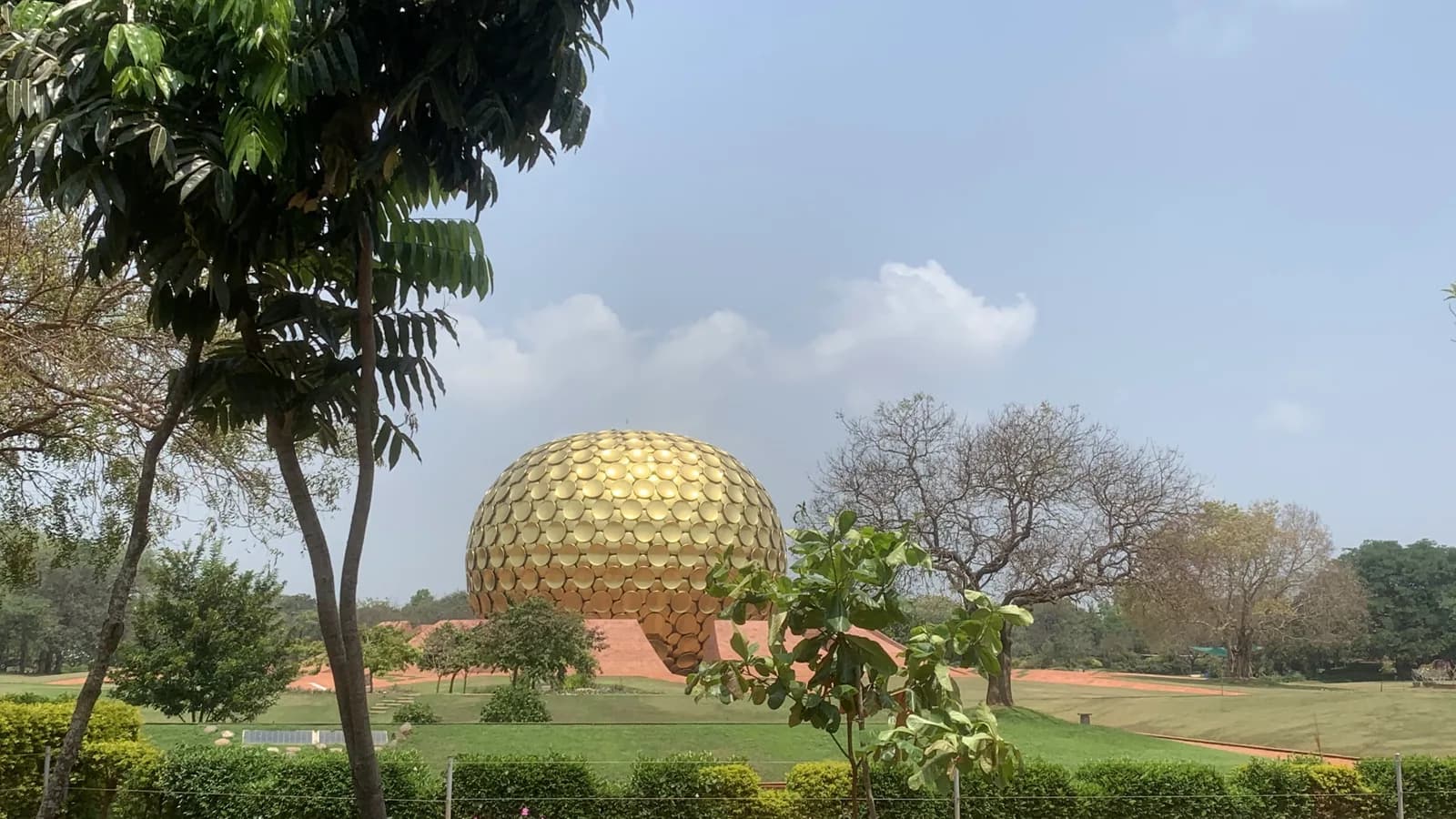 Matrimandir seen across its gardens on Aanand’s first day in Auroville