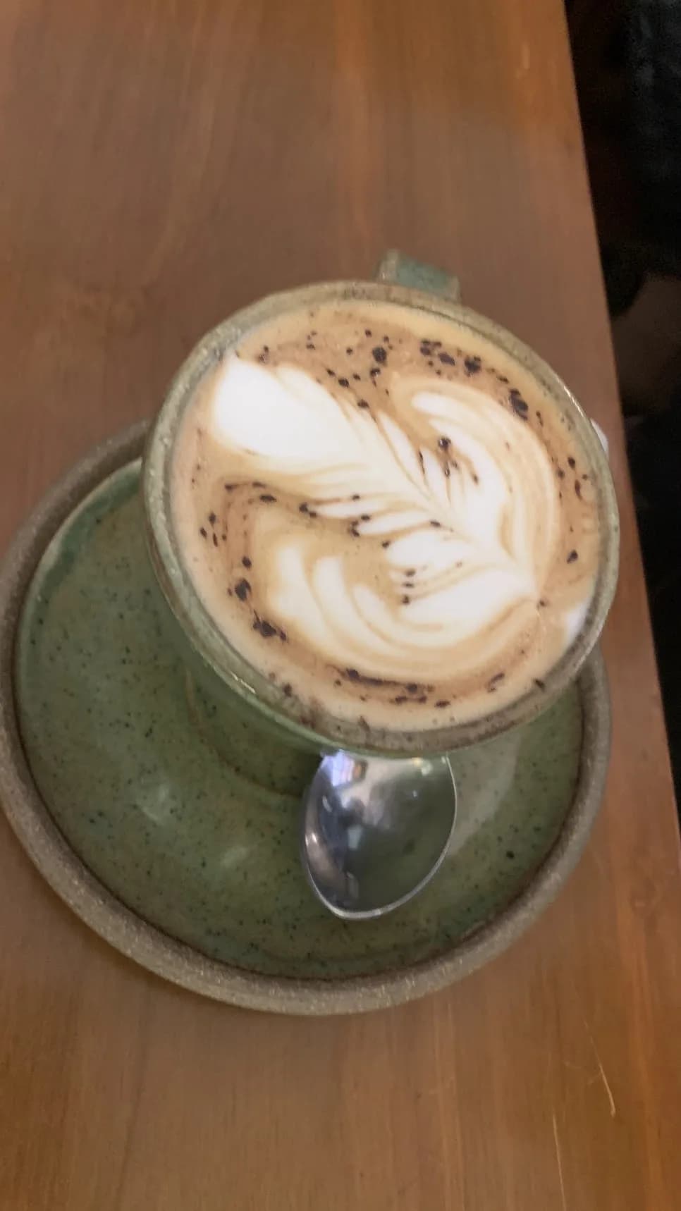 A cup of coffee served at Marc's Coffee in Auroville
