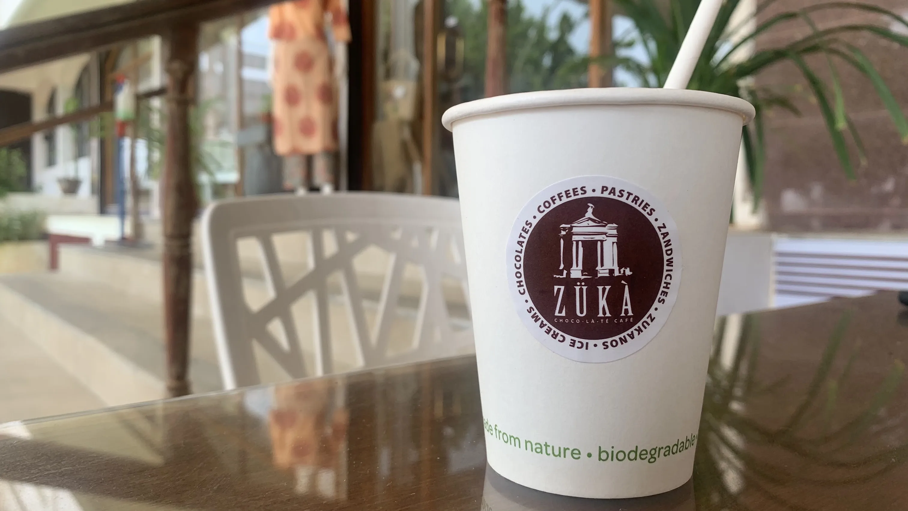 A cup of coffee on the table at Zuka near Rock Beach